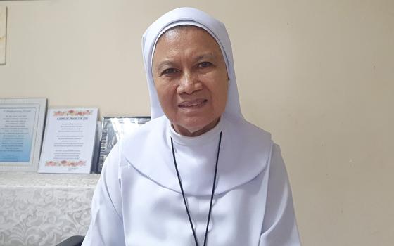 Sr. Eva Fidela Maamo, a member of Sisters of St. Paul de Chartres, in the conference room at the Foundation of Our Lady of Peace Mission in Paranaque City, Philippines (Oliver Samson)