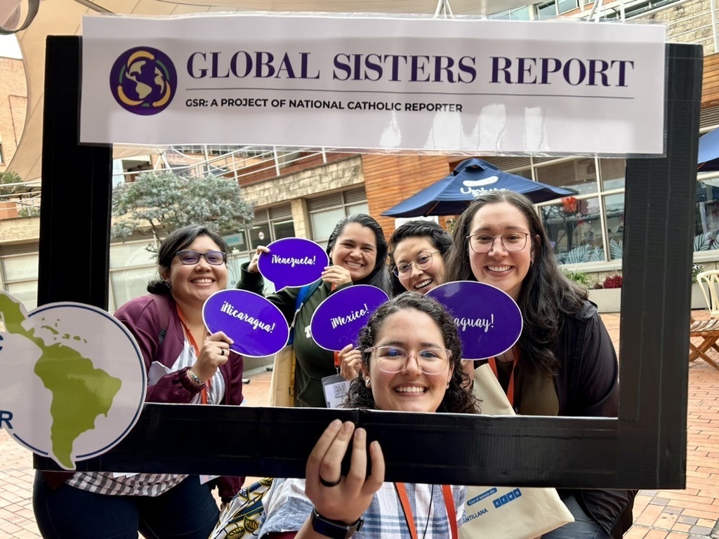 Sisters from different countries in Latin America stop to take a picture at the GSR booth during the IV Latin American and Caribbean Congress of Religious Life, held Nov. 24-26 in Bogotá, Colombia. (Courtesy of Molly Brockwell)