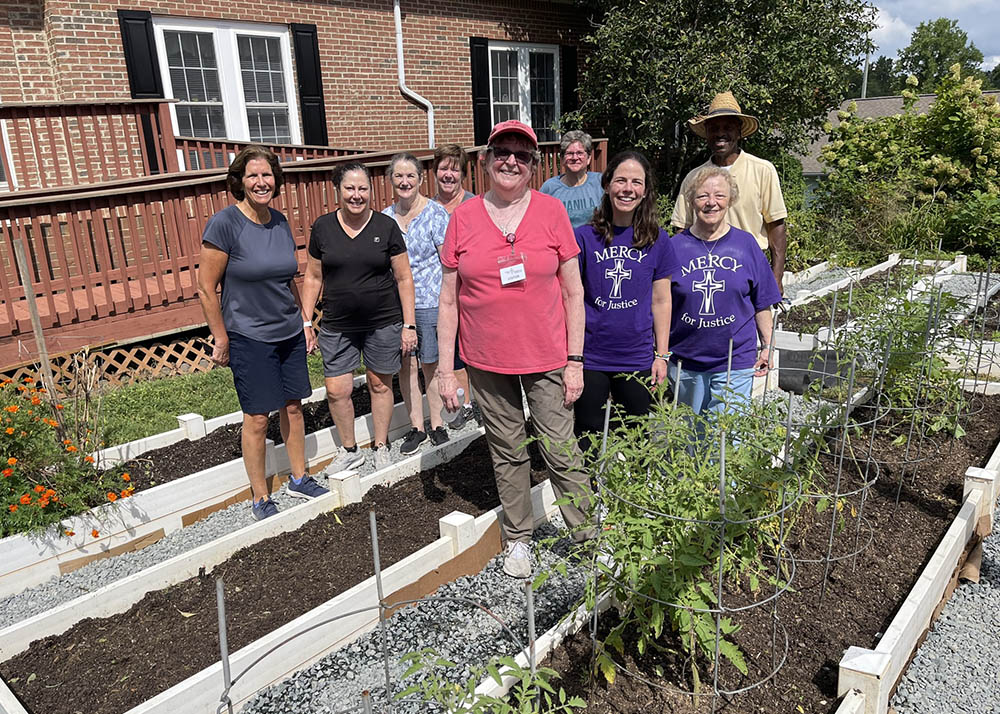 Mercy Education staff participate in a morning of service supporting the horticultural therapy program at Holy Angels Belmont, North Carolina, a Mercy ministry that serves people with disabilities. (Courtesy of Mercy Education)