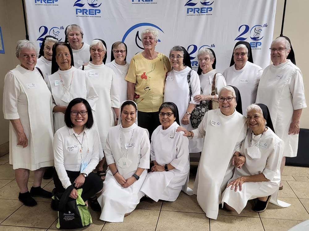 Dominican Sr. Mary Sean Hodges, back row center, poses with Dominican Sisters at PREP's 20th anniversary celebration Aug. 13 at St. Basil's Church in Los Angeles. (Courtesy of PREP)