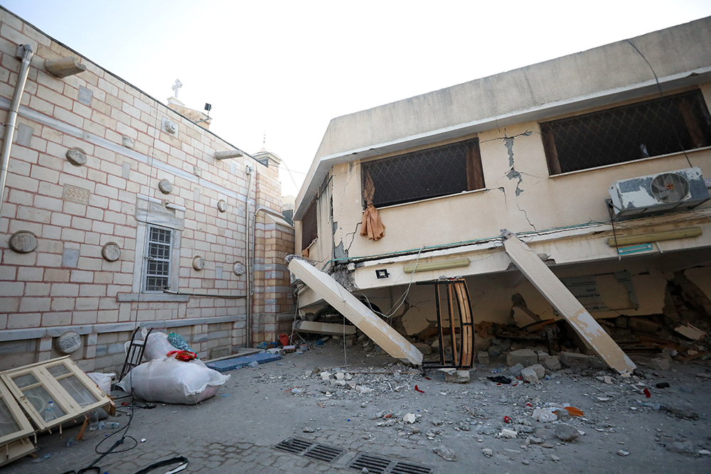Debris surrounds St. Porphyrios Greek Orthodox Church in Gaza Oct. 20 after an explosion went off the night before. (OSV News/Reuters/Mohammed Al-Masri)