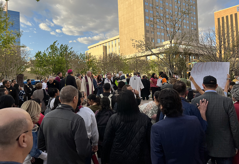 Ruben Garcia of Annunciation House, center, is pictured at the "Do Not Be Afraid: March and Vigil for Human Dignity" in El Paso, Texas, protesting Texas Senate Bill 4, or SB 4.  (Evan Bednarz)