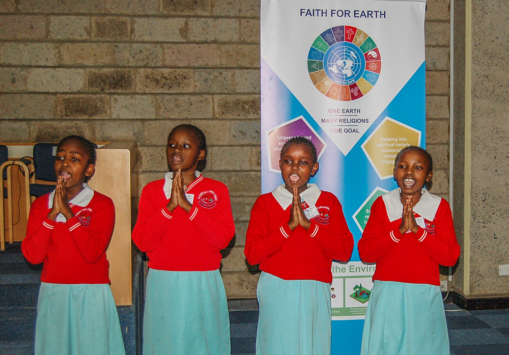 Children from St. Dominic Savio Primary School in Nairobi, Kenya, are seen July 15, 2019, during an environmental conference on the grounds of the United Nations in Nairobi. The conference marked the fifth anniversary of the Catholic Youth Network on Environment and Sustainability in Africa and the fourth anniversary of Pope Francis' environmental encyclical, Laudato Si'. (CNS/Fredrick Nzwili)