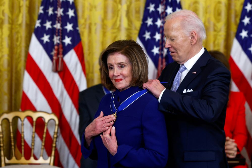 U.S. President Joe Biden presents the Presidential Medal of Freedom to former House Speaker Nancy Pelosi, D-Calif., a Catholic, during a ceremony at the White House in Washington May 3. 