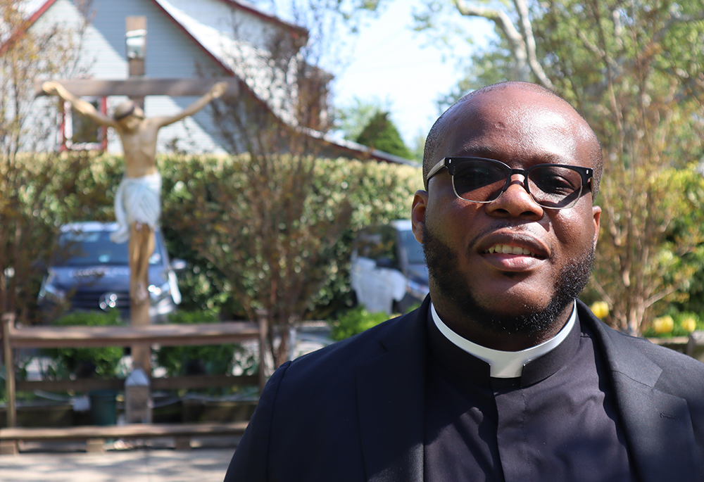 Fr. Dwayne Davis, pastor of St. Thomas Aquinas in Brooklyn, spoke to NCR about the parish's work to help migrants at a nearby encampment: "It's not about politics for us. It's about living the Gospel." (Courtesy of St. Thomas Aquinas Church)