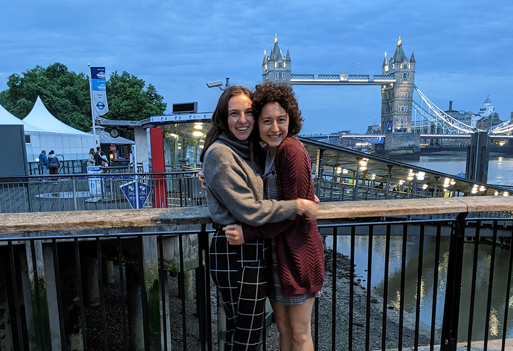 I smile and embrace my friend, Claire (left), as we visit Tower Bridge in London. My trip to visit Claire was an opportunity for us to reconnect and for me to get a glimpse into the place she currently is, in the United Kingdom. (Courtesy of Eli Terry)