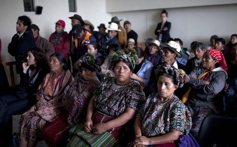 A group of indigenous Ixil women listen during the trial against Gen. Efraín Ríos Montt in Guatemala City Jan 31. (EFE/Saul Martinez)