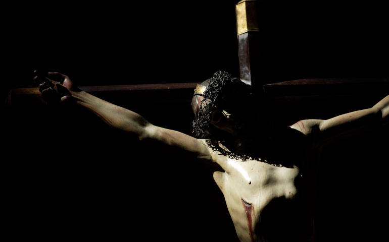 Light shines on a crucifix in the Metropolitan Cathedral in Mexico City. (CNS/Chico Sanchez)