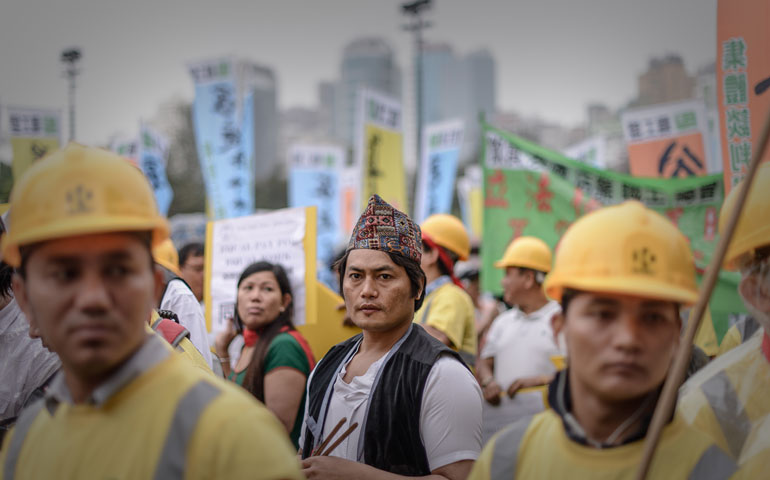Migrant workers from Nepal take part in a Labor Day rally in Hong Kong on May 1. (AFP/Getty Images/Philippe Lopez)