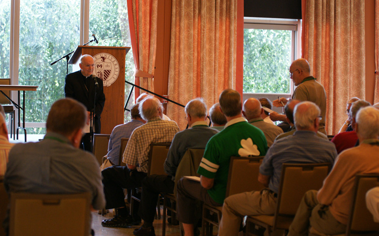 Bishop Donald Trautman of Erie, Pa., answers questions at the second annual assembly of the Association of U.S. Catholic Priests. (Maria Laughlin)