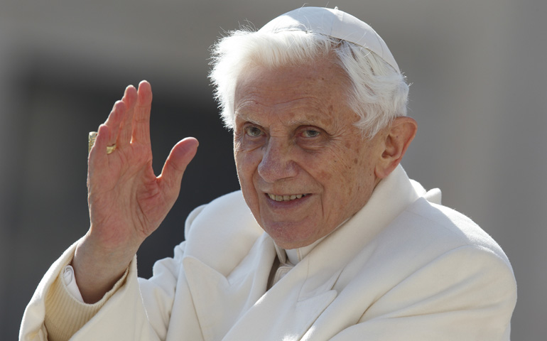 Pope Benedict XVI waves as he leaves his final general audience Wednesday in St. Peter's Square at the Vatican. (CNS/Paul Haring)