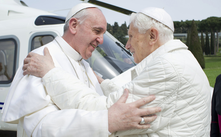 Pope Francis embraces emeritus Pope Benedict XVI on Saturday at the papal summer residence in Castel Gandolfo, Italy. (CNS/Reuters/L'Osservatore Romano)