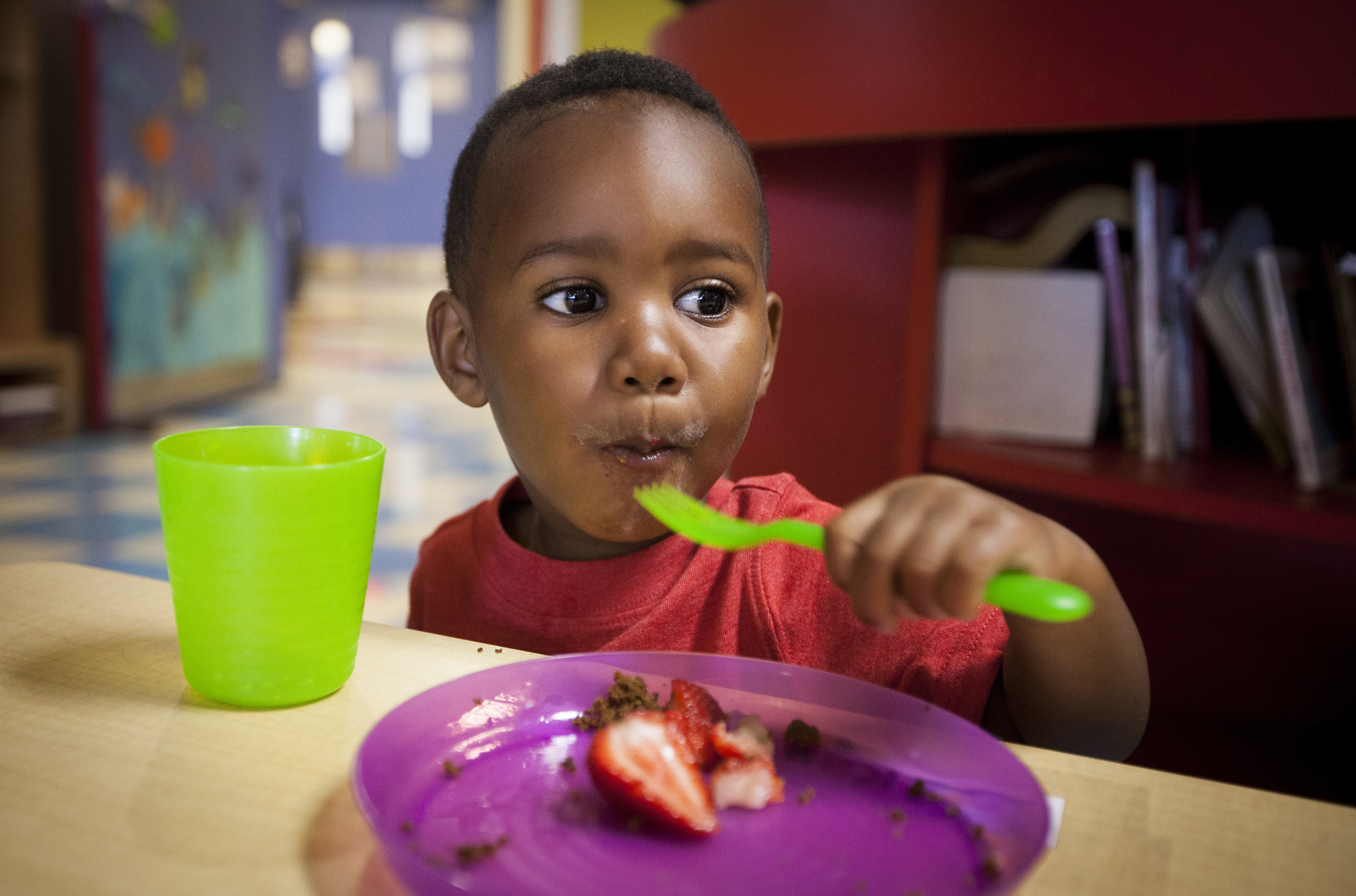 Kayden Grady, 2, takes a bite of his breakfast at a Baltimore Catholic Charities Head Start program in Edgewood, Md., June 13. While severe malnourishment is rare in the U.S., more than 16 million children live in households that are unable to access enough nutritious food for a healthy life, according to the U.S. Department of Agriculture. (CNS photo/Nancy Phelan Wiechec)