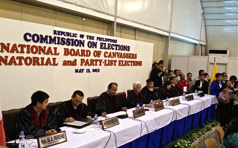 The Philippines Commission on Elections convenes as votes are counted in the May 13 national elections. (Photo by Chona Yu)