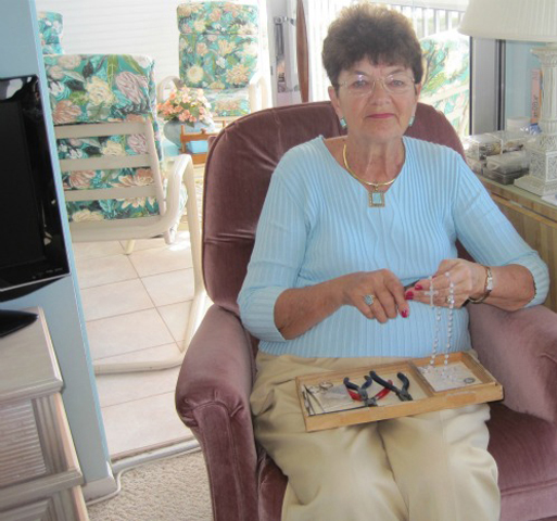 At age 75, Betty Holden is on a crusade to repair broken rosaries. She's been at it for almost 20 years, spending several hours a day behind a pair of needle-nose pliers. (RNS/Courtesy of Betty Holden)