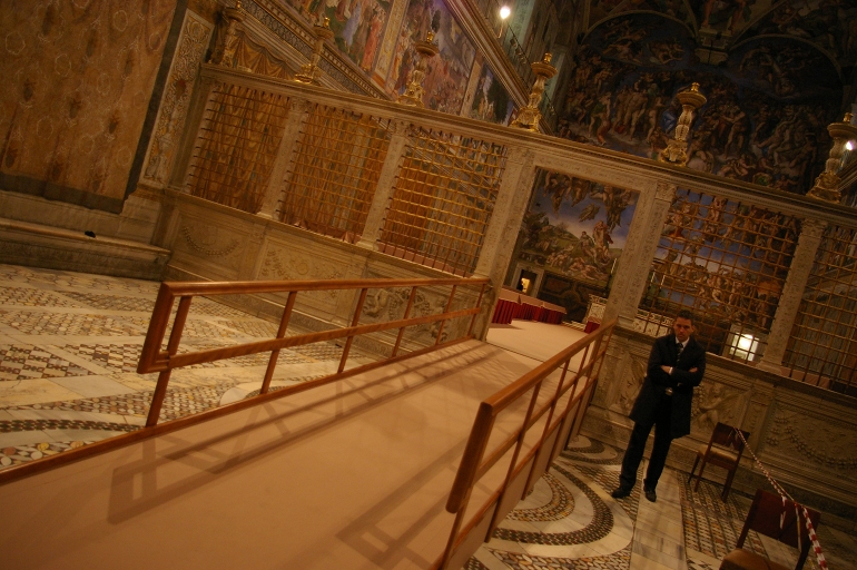The Sistine Chapel, where the cardinal electors will vote for the next Roman pontiff, has been specially altered with a new accessible floor for the aging prelates. Here you see a ramp, leading to the cardinals' seating area. (NCR photo/Joshua J. McElwee)