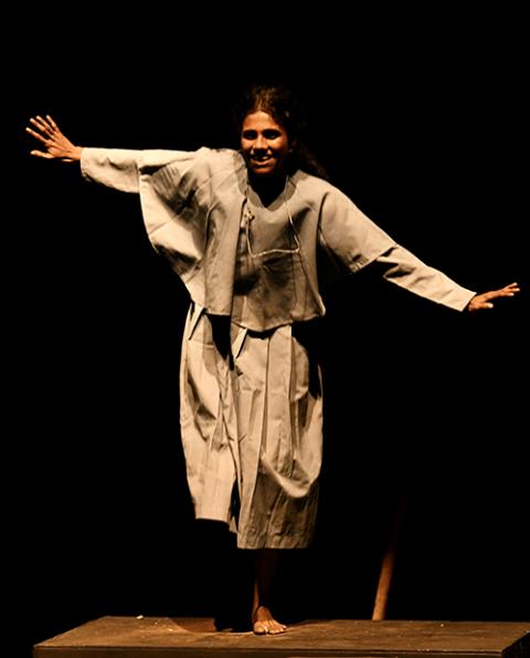 An actor playing a Catholic nun in the controversial Malayalam drama "Kakkukali" mimics a game played by girls in the southwestern Indian state of Kerala. (Raneesh Raveendran)