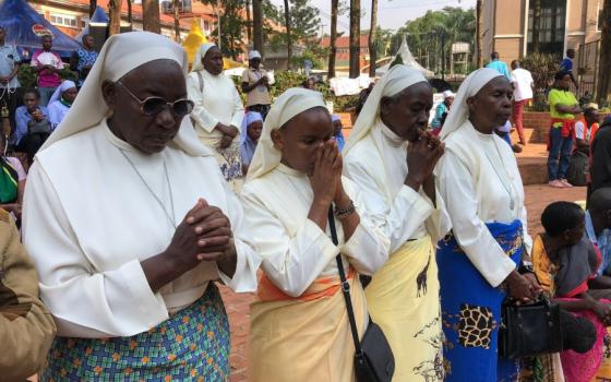 Catholic sisters pray at the  Uganda Martyrs Shrine at Namugongo in Kampala, Uganda's capital. The site honors 22 Catholics killed in the 19th century for refusing to denounce their faith. (GSR photo/Gerald Matembu)