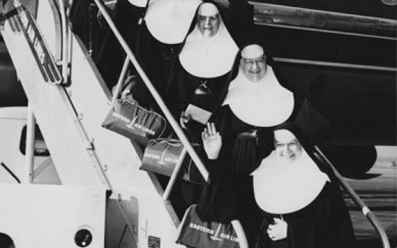 Mercy Sisters board a plane bound for Peru in a historical image shown in the documentary "Band of Sisters." (Sisters of Mercy Archives West Midwest-Chicago Community)