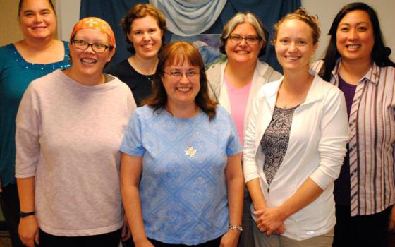 The Giving Voice attendees who have made or will make final vows in 2015: (back row, from left) Margaret Mary Foley, OSF; Alison Green, SSMO; Jenny Wilson, RSM; Thuy Tran, CSJ; (front row, from left) Julia Walsh, FSPA; Amy Taylor, FSPA; Jessi Beck, PBVM (GSR photo/Dawn Cherie Araujo)