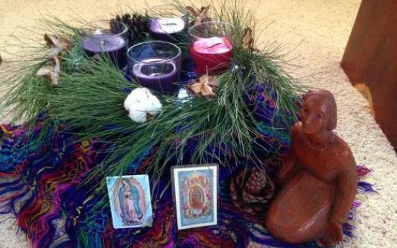 Advent wreath with Guadalupana prayer cards. (Janet Gildea)