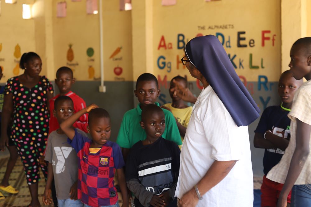 Sr. Amala Ranee Santiago interacts with children at St Joseph's School 