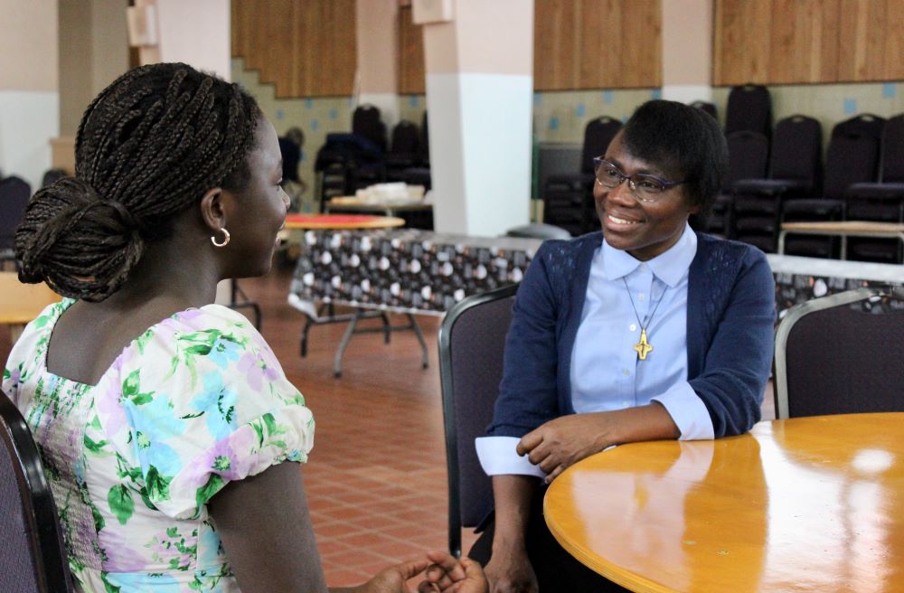 Sr. Joséphine Kimbolo with one of the young women she accompanies 