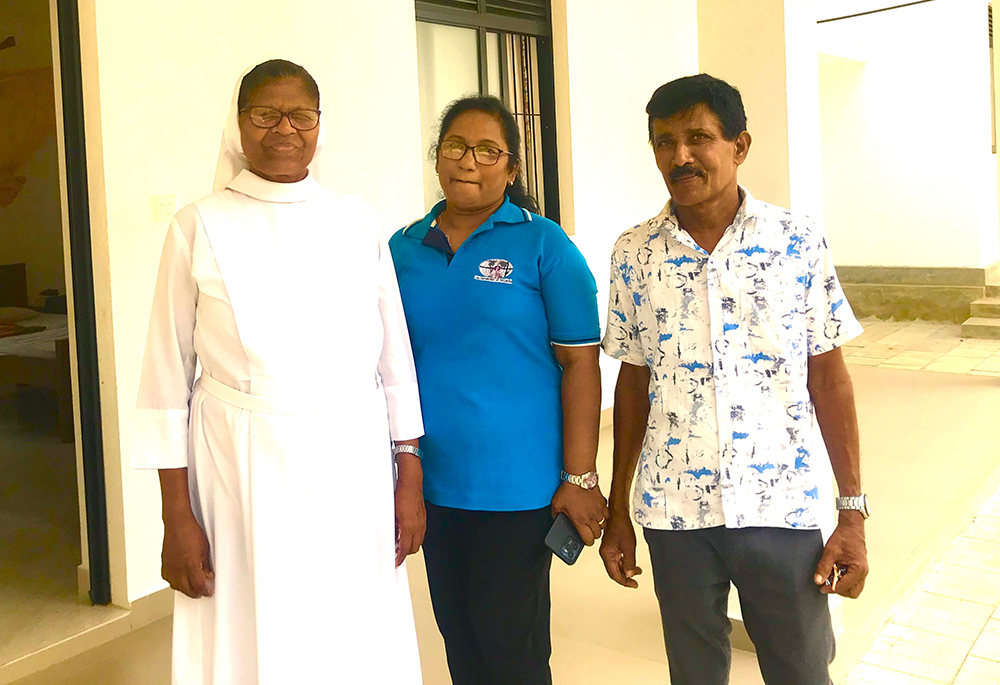 Lay Salvatorians, Renuka Damayanthi and her husband Christie Fernando, are pictured with Sr. Dulcie Fernando, former provincial of Salvatorians in Sri Lanka. (Thomas Scaria)