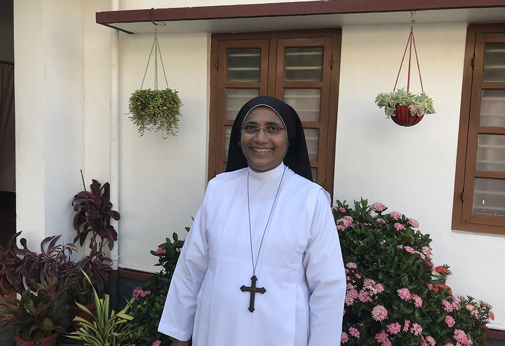 Sr. Ardra Kuzhinapurathu, the first woman to head the major superiors of Kerala, is pictured at the entrance of her motherhouse in Kottayam, central Kerala. (GSR photo/Thomas Scaria)