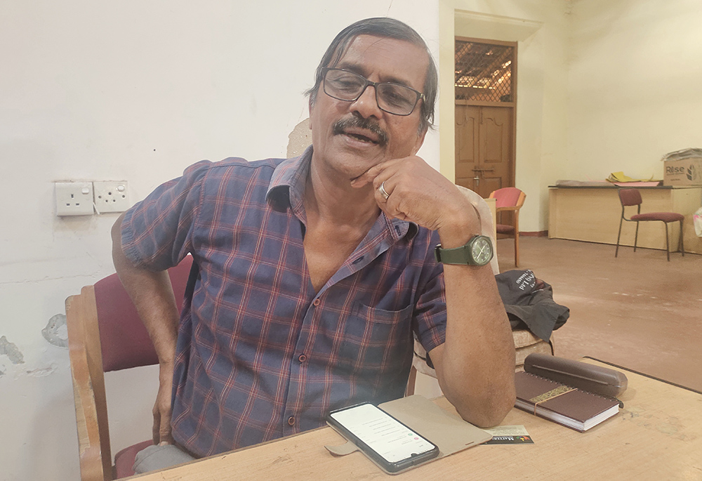 Nimal Ignatius Perera, national president of the Lay Salvatorians in Sri Lanka, is pictured at his office in Negombo, a town in Sri Lanka. (Thomas Scaria)