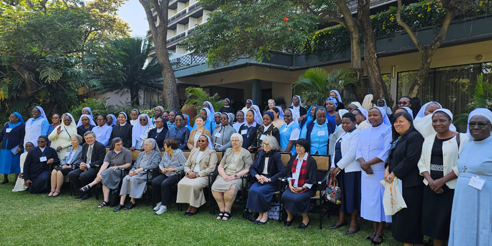 Catholic sisters, grantors, and other partners pose for a group photo during the Conrad N. Hilton Foundation's Catholic Sisters Initiative convening in Zambia's capital, Lusaka. (GSR photo/Doreen Ajiambo)