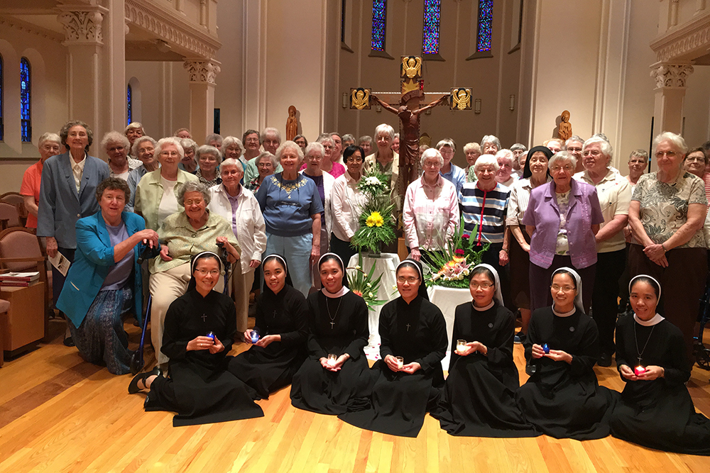 Vietnamese Lovers of the Holy Cross Sisters are pictured with School Sisters of Notre Dame on Sept. 14, 2017, in St. Louis, Missouri. (Ngoc Nguyen)