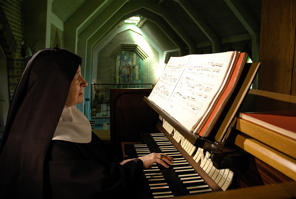 Mother Abbess Isabelle Thouin plays the organ at the Abbey of Sainte-Marie des Deux-Montagnes in Sainte-Marthe-sur-le-Lac, Quebec. (Courtesy of Philippe Hachey)