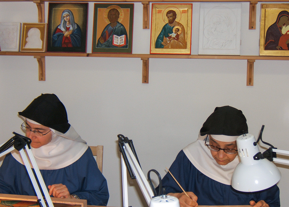 Benedictine Srs. Martine Roy and Sr. Louise Lussier prepare icons in their atelier at the Abbey of Sainte-Marie des Deux-Montagnes in Sainte-Marthe-sur-le-Lac, Quebec. (Courtesy of Serge Therrien)