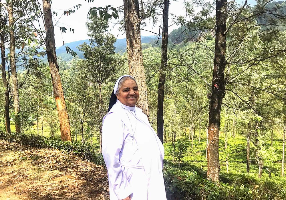 Apostolic Carmel Sr. Maria Amali at a tea plantation at Pussellawa in Sri Lanka, where she visits workers, despite her painful abdominal cancer (Thomas Scaria)