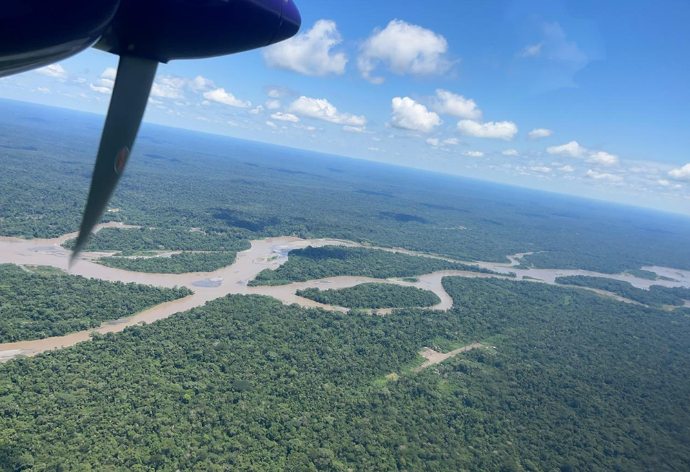 Dense jungle and rivers are visible from the window a small plane flying tourists into the Amazon.  (Courtesy of Lorene Heck) 