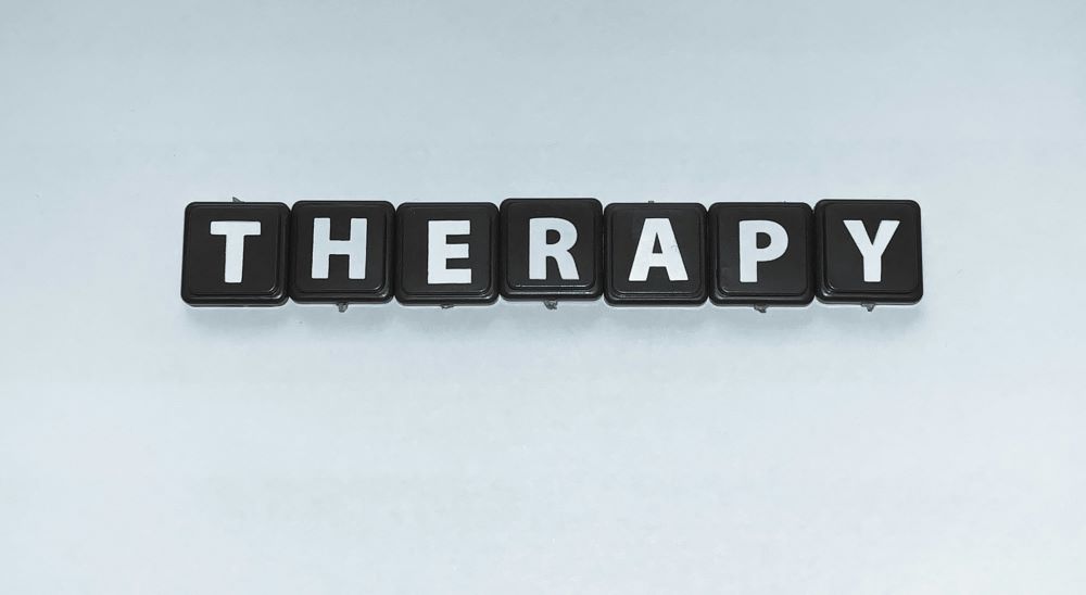 tiles spell "therapy"