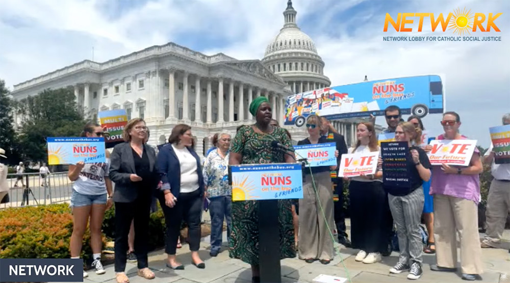 Precious Blood Sr. Mumbi Kigutha, president of Friends in Solidarity, speaks at a press conference July 23 in Washington, D.C., announcing the return of the Network social justice lobby's Nuns on the Bus tour. (GSR screenshot)