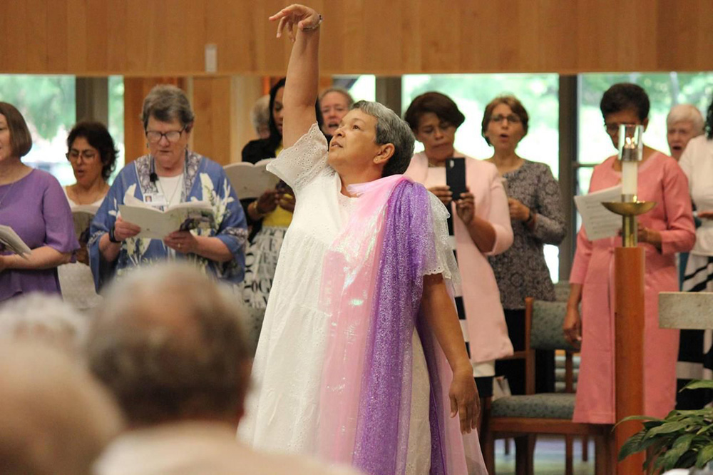 Dominican Sr. Nery Sori worships God through liturgical dance at the Dominican Sisters of Adrian Motherhouse Chapel in Michigan. (Nery Sori) 