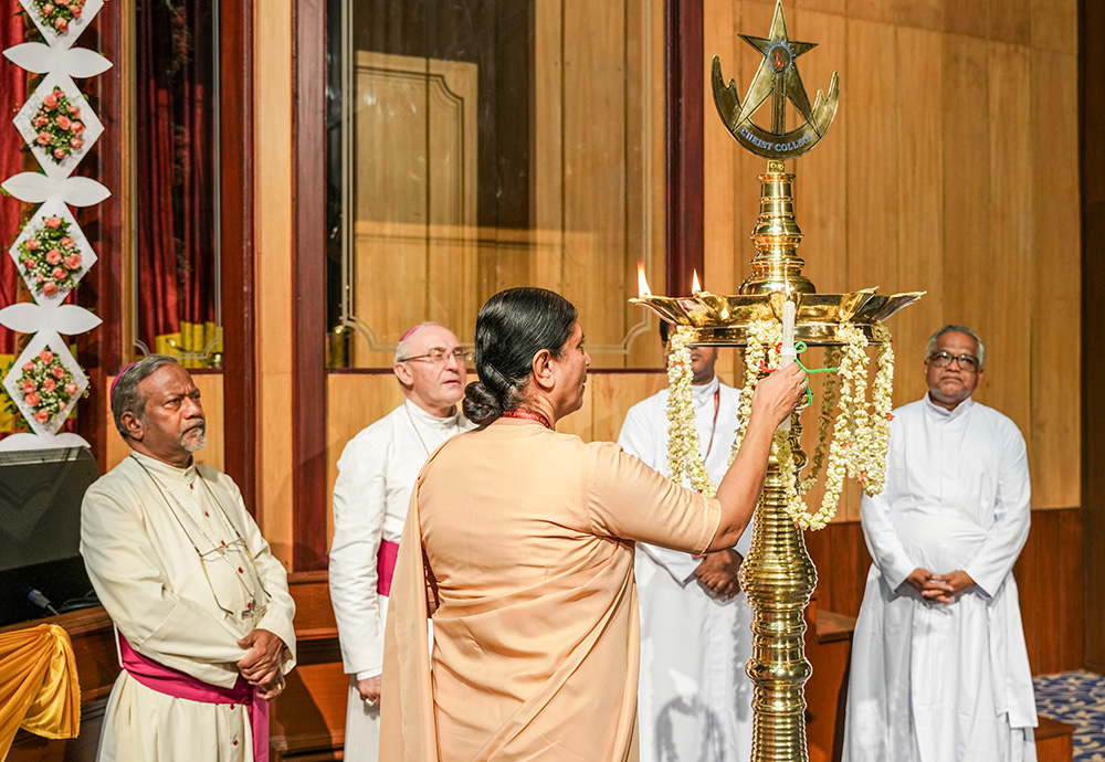 Apostolic Carmel Sr. Maria Nirmalini, president of the women's wing of the Conference of Religious India, lights a lamp to mark the opening of the conference's national assembly May 14 in Bengaluru, southern India. (Courtesy of Maria Nirmalini)