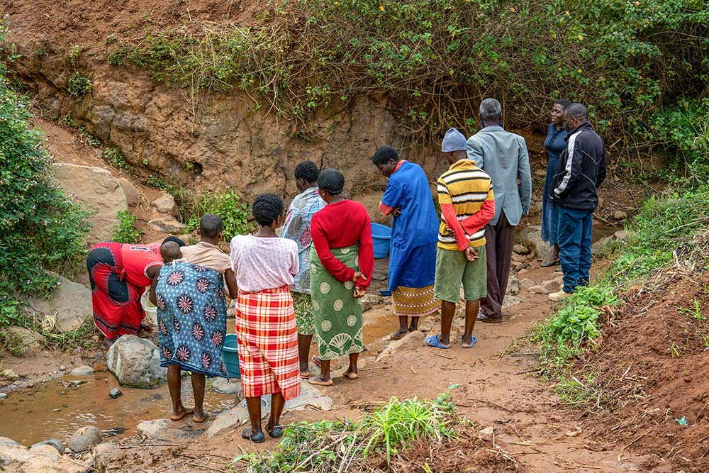 A local running stream in Mphatso village, Malawi, where the people bathed and drank before they got a water pump on June 22, 2021 (Courtesy of Monica Ichife)