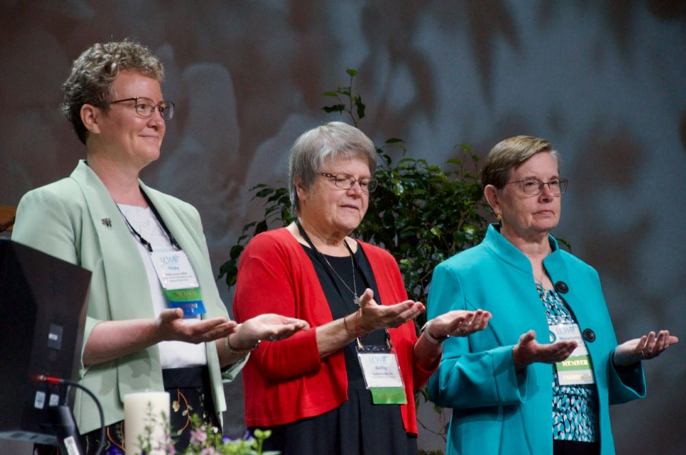 Three women, with Vicky Larson at left 