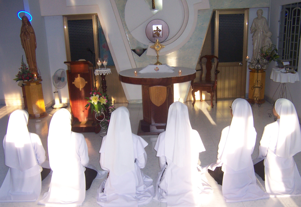 Sisters sit in adoration of the Blessed Sacrament at the Monastery of Our Lady of the Holy Spirit in Xuan Loc Diocese, Vietnam. (Sophia Quy Nguyen)