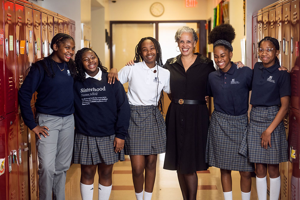 Dr. Beth Reaves (third from right), president of Washington School for Girls, stands alongside several students. (Courtesy of Washington School for Girls)