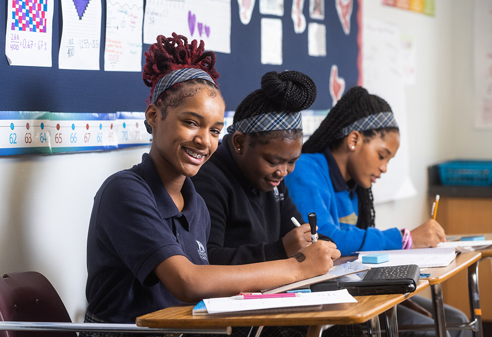 Students work on assignments at Washington School for Girls. "We lean into developing these girls, so they come away feeling they can be whatever they choose to be," says school president Beth Reaves. (Courtesy of Washington School for Girls)