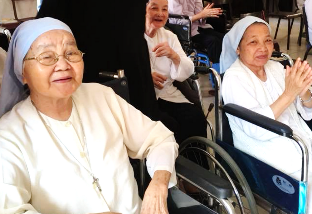 St. Paul de Chartres Srs. Benedictine Pham Dieu Canh, left, and Anna Nguyen Thi Tuy, right, who fled to southern Vietnam in 1954, are at a house for older nuns in Hue on July 8, 2024. (GSR photo)