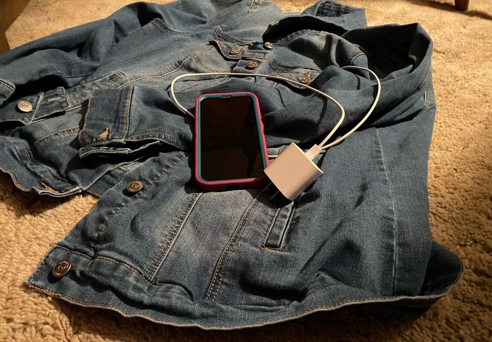 A denim jacket and a cellphone