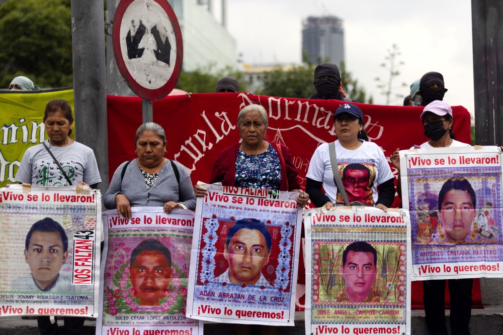 Demonstrators and students protest in Mexico City Sept. 25.