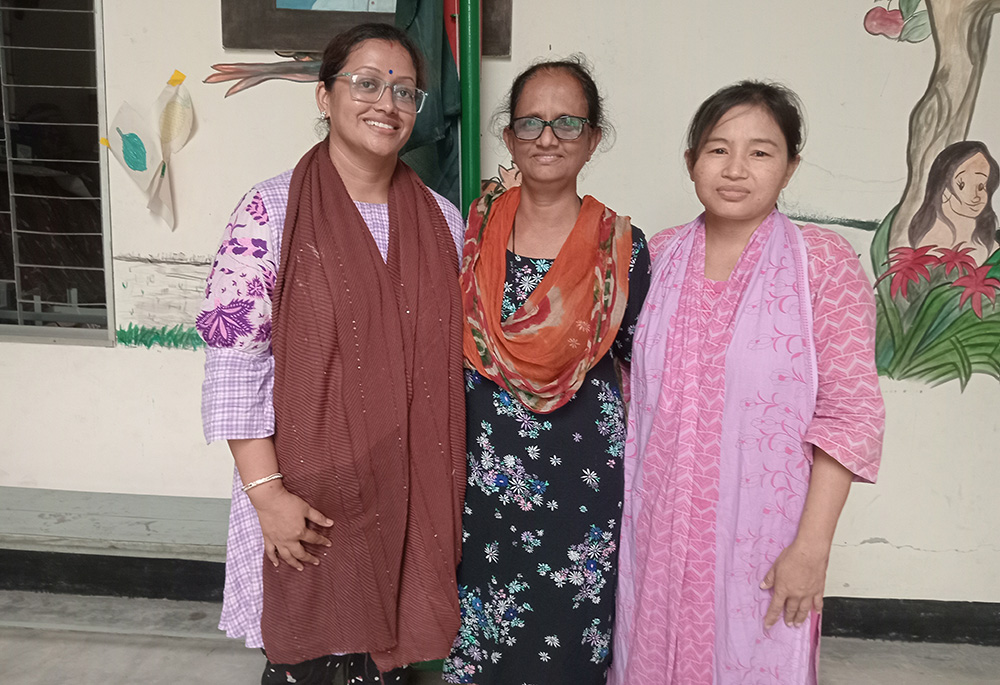 From left: Lopa Chakraborty, a Hindu woman, Sr. Nirmola Maria Goretti Cruze, and Buddhist Dipa Chakma are pictured at the Hope Center. Chakraborty and Chakma are mothers of children at the center. (Sumon Corraya)