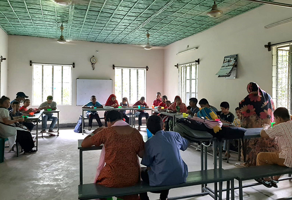 Children enjoy tiffin at the Hope Center. (Sumon Corraya)